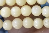 CTG1596 15.5 inches 4mm round yellow jade beads wholesale