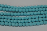 CTU1220 15.5 inches 4mm faceted round synthetic turquoise beads