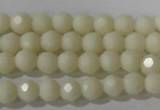 CTU1440 15.5 inches 4mm faceted round synthetic turquoise beads