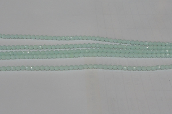 CTU2571 15.5 inches 4mm faceted round synthetic turquoise beads