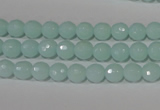 CTU2572 15.5 inches 6mm faceted round synthetic turquoise beads