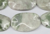 CTW307 15.5 inches 20*30mm wavy oval peace stone beads