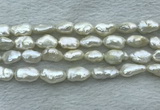 FWP353 15 inches 9mm - 10mm baroque white freshwater pearl strands