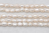 FWP496 14 inches 8mm - 9mm baroque white freshwater pearl strands