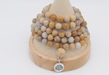 GMN2211 Hand-knotted 8mm, 10mm matte fossil coral 108 beads mala necklace with charm