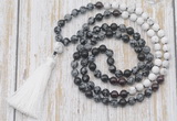 GMN6359 Knotted 8mm, 10mm snowflake obsidian, garnet & matte white howlite 108 beads mala necklace with tassel