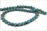 TURQ34 15 inches 10mm round synthetic turquoise with shelled beads